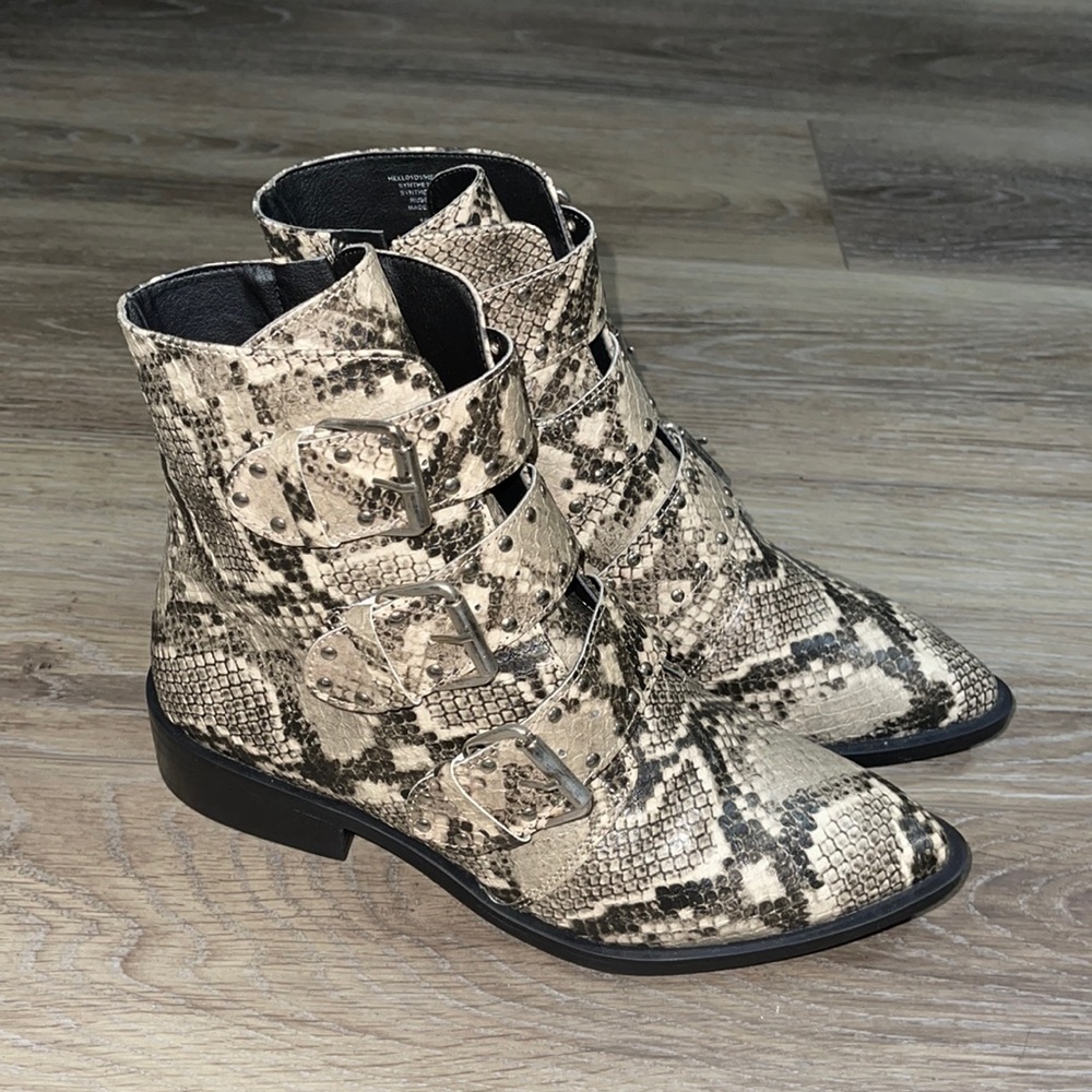 BRAND NEW Steven by Steve Madden snake skin print leather boots.